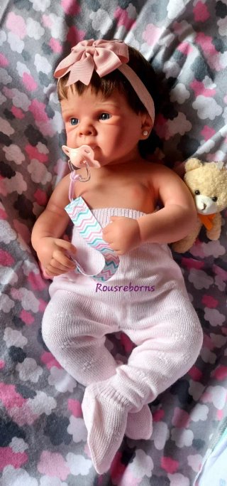 Preciosa bebé reborn silicona niña con pelito