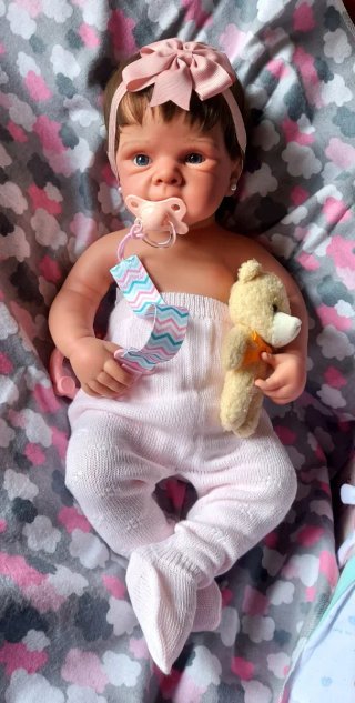 Preciosa bebé reborn silicona niña con pelito