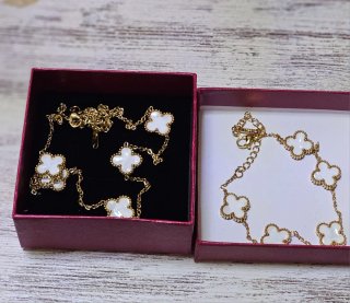 Conjunto collar y pulsera trébol oro blanco