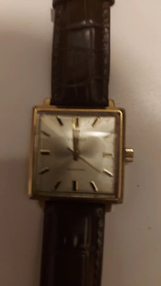 Reloj Tissot Seastar Cuadrado Dorado y Marrón