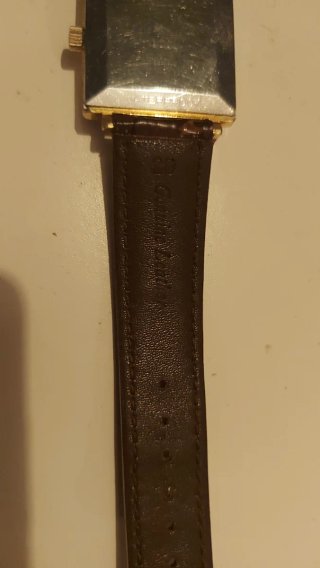 Reloj Tissot Seastar Cuadrado Dorado y Marrón
