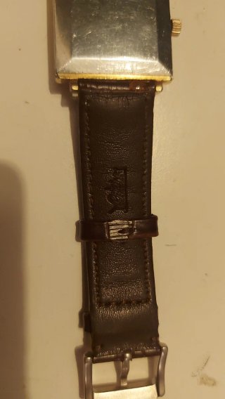 Reloj Tissot Seastar Cuadrado Dorado y Marrón