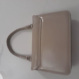Borsetta beige con fiocco
