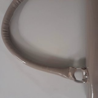 Borsetta beige con fiocco