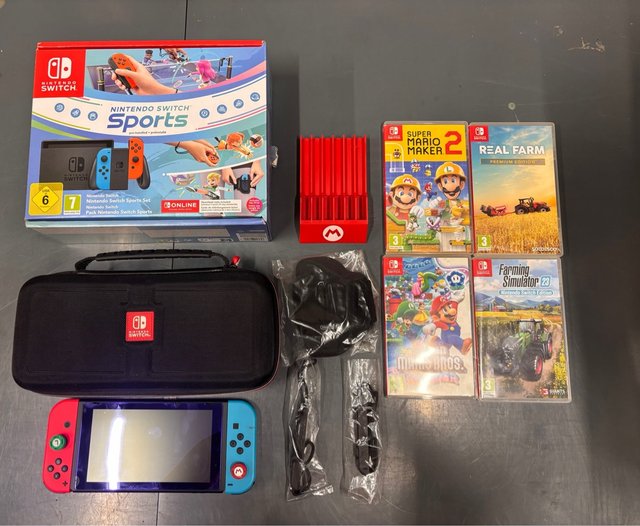 Nintendo Switch + 4 Juegos + Accesorios