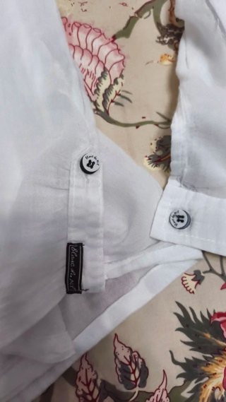 Camisa blanca de manga larga