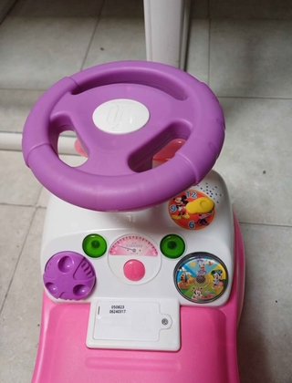 Cochecito infantil rosa y blanco