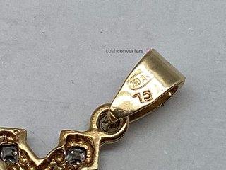 colgante oro 18k con piedra