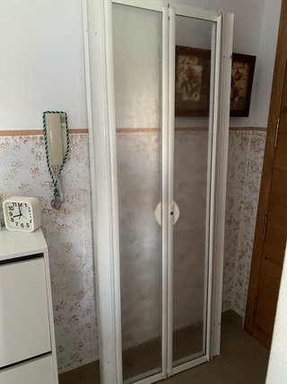 Mampara de ducha cristal y plástico