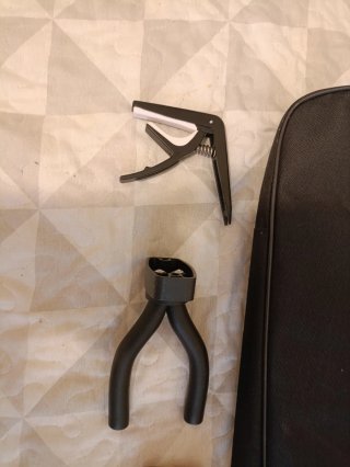 Funda de guitarra y accesorios