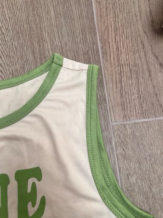 Top crop Love Never Fails beige e verde