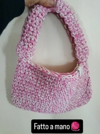 Borsa piccola fatta a mano rosa e bianca