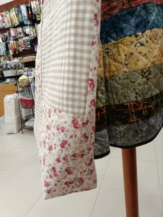 Bolso de tela estampado floral y cuadros