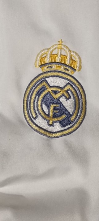 Chaqueta Real Madrid Universitaria Blanca.