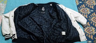 Chaqueta Real Madrid Universitaria Blanca.