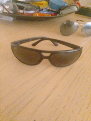 Gafas de sol Ray-Ban negras y grises