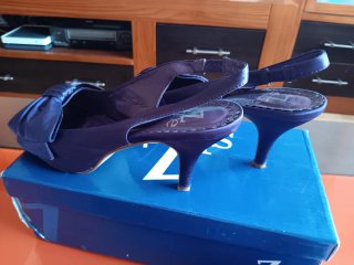 Conjunto bolso y sandalia morado