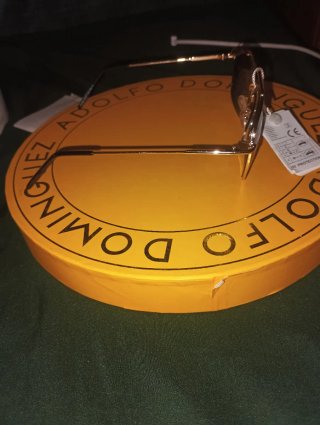 Occhiali da sole marroni e dorati