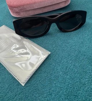 Occhiali da sole Miu Miu