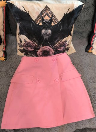Falda Stradivarius rosa botones