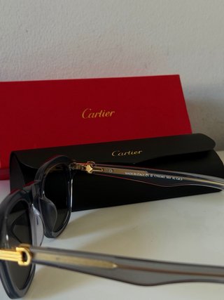 Occhiali da sole Cartier neri e dorati