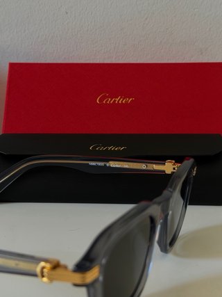 Occhiali da sole Cartier neri e dorati