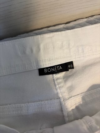 Pantaloni bianchi con zip