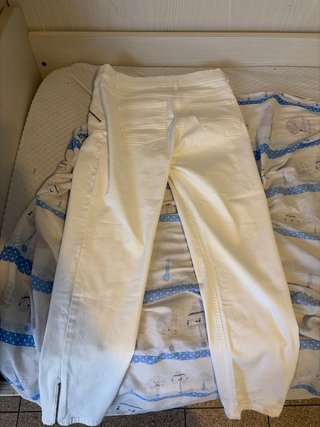 Pantaloni bianchi con zip