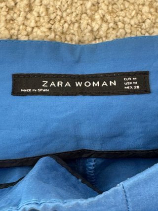 Falda Zara azul con cinturón