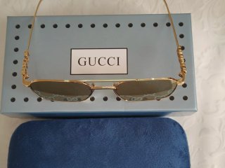 Occhiali da sole Gucci unisex oro Reflex fucsia