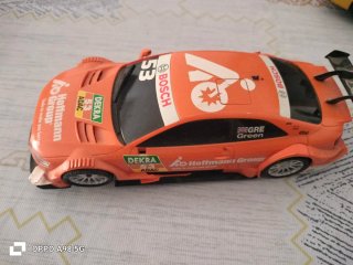 Coche de carreras naranja Scalextric/Carrera GO!!!