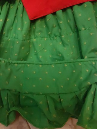 Traje de flamenca verde con lunares bordados
