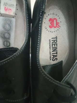 Zapatos Rogell piel abotinados negros talla 38