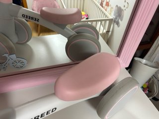 Triciclo infantil rosa y gris