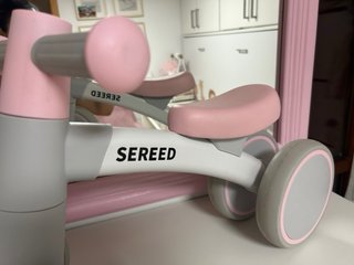 Triciclo infantil rosa y gris