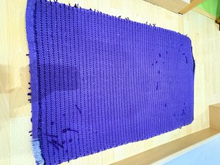 Alfombras moradas pelo medio