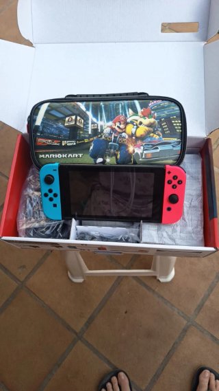 Nintendo Switch + juego mario kart