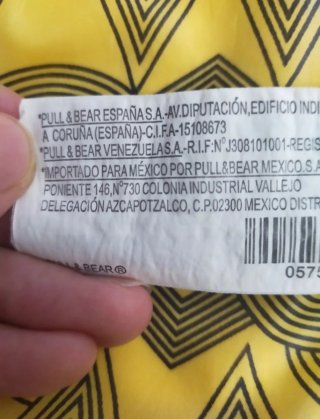 Abrigo Pull&Bear entretiempo amarillo