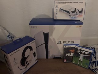 Consola PS5 Slim con lettore + giochi e accessori