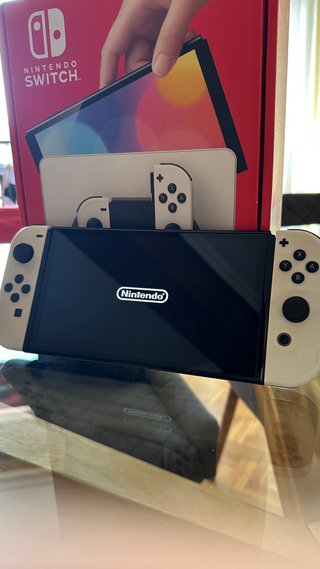 Nintendo Switch Oled + funda + microsd + protector