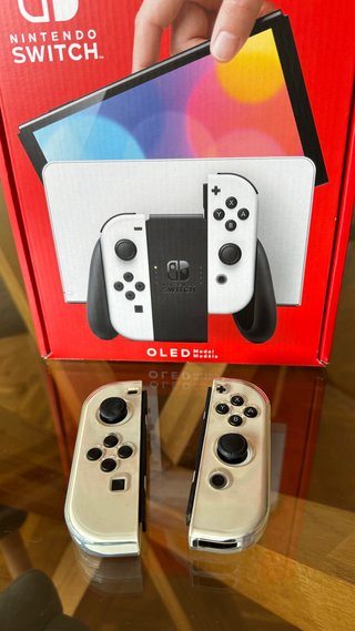 Nintendo Switch Oled + funda + microsd + protector