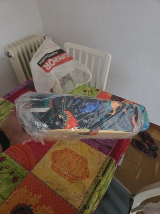 Alzador silla infantil dinosaurios.