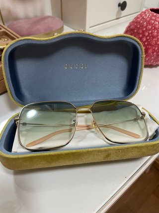 Occhiali da sole Gucci dorati e verdi