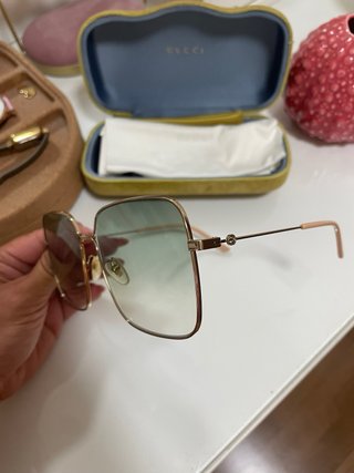 Occhiali da sole Gucci dorati e verdi