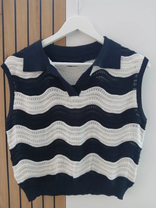 Blusa sin mangas con cuello polo