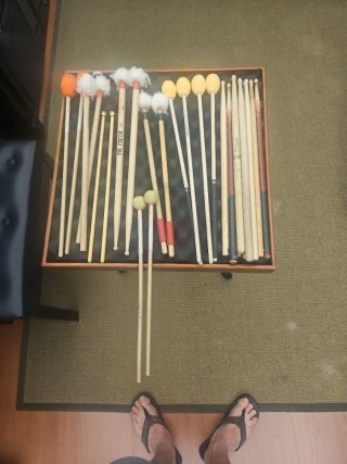 Conjunto de baquetas de percusión