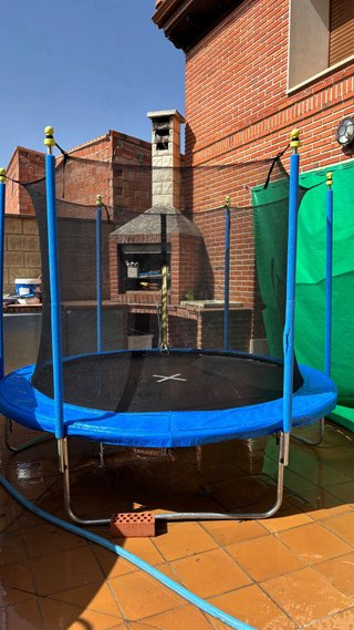 Cama elástica infantil con red de seguridad