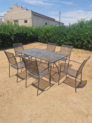 Mesa y 6 sillas de exterior