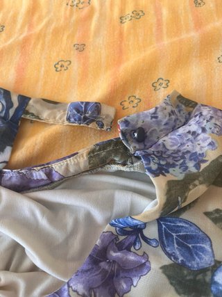 Blusa floreale smanicata