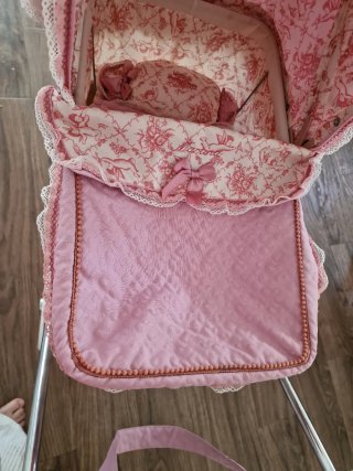 Cochecito bebé reborn rosa